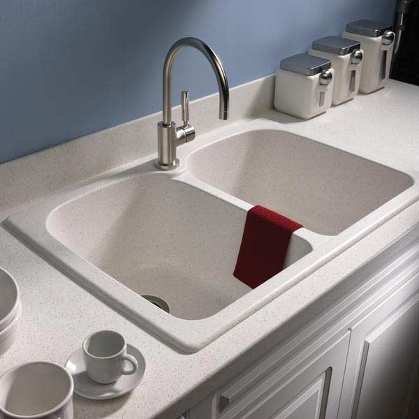 Double bowl solid surface sink